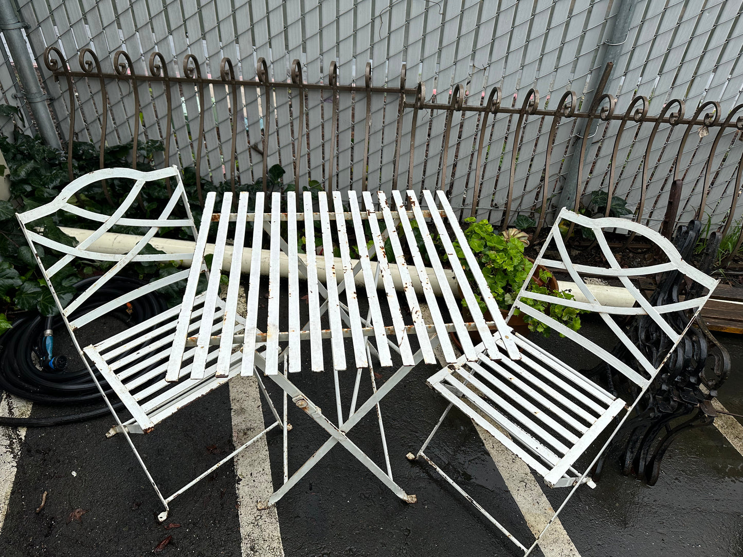 White patio table and chairs