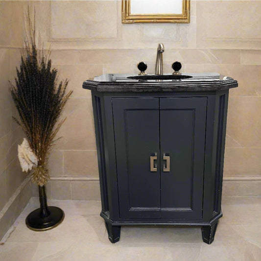 Black vanity with Jorger Florale widespread lavatory faucet and black crystal knobs