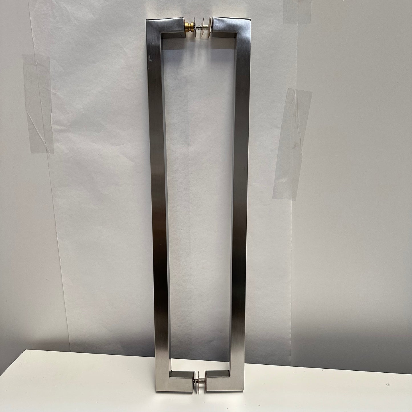 Stainless steel back-to-back door pulls