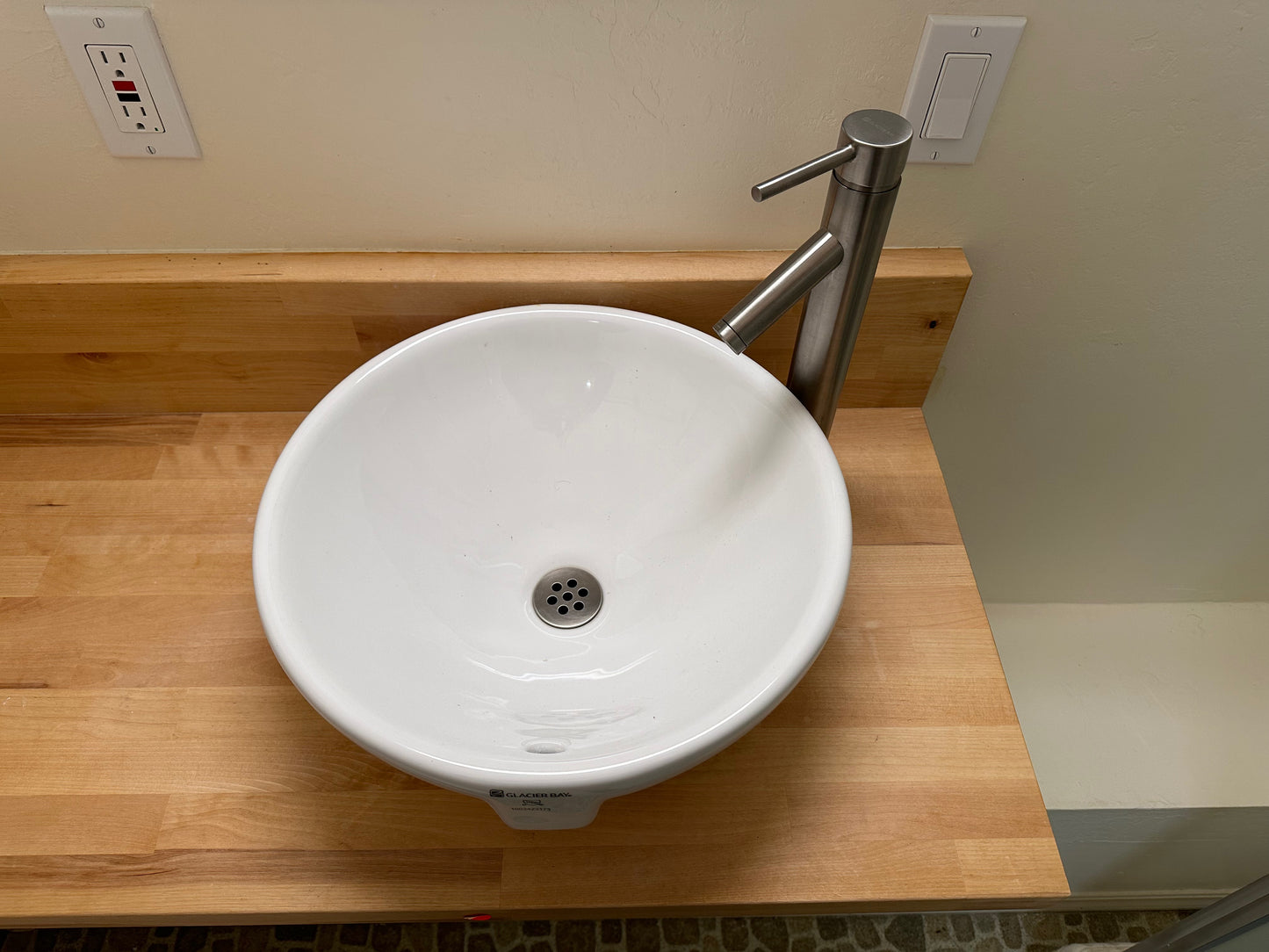 Glacier Bay Faucet and Vessel Sink on Butcher Block Vanity Countertop