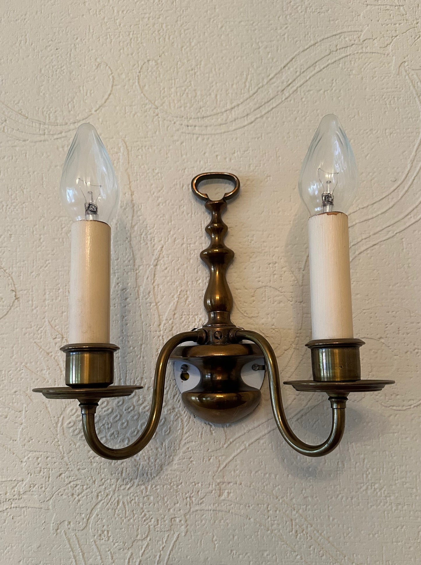 metal reclaimed salvage wall sconce with candle shaped light fixtures