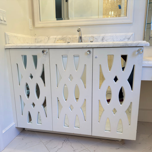 White vanity with mirrored front