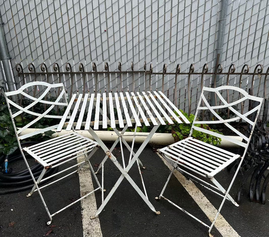 White patio table and chairs